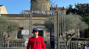 The actor Lorànt Deutsch in front of the Brive lighthouse during the filming of his Youtube show