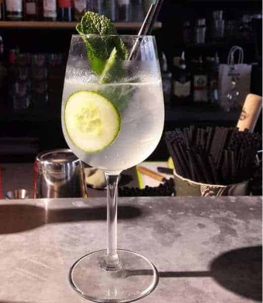 Glass containing the Denoiselle cocktail created by Maison Denoix