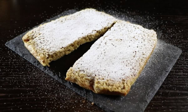 Walnut fondant sprinkled with icing sugar