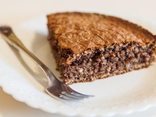 slice of walnut cake served on a plate