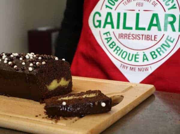 Chocolate cake with moustache-shaped vanilla cake insert