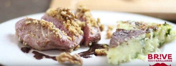 Plate of walnut-crusted duck breast