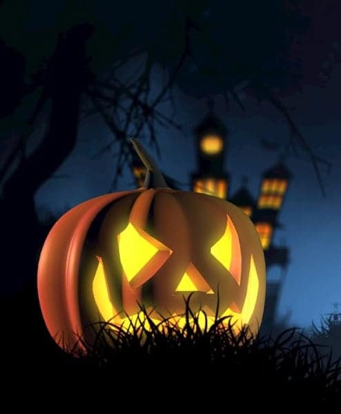 Représentation d'Halloween avec manoir abandonné et citrouille.